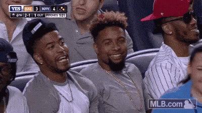 Group Of Men Laughing In Stadium GIF