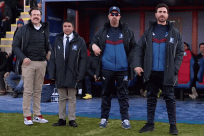 Group Of Men On Field With T-Shirt Letter T GIF