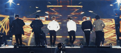 Group Of Men On Stage GIF