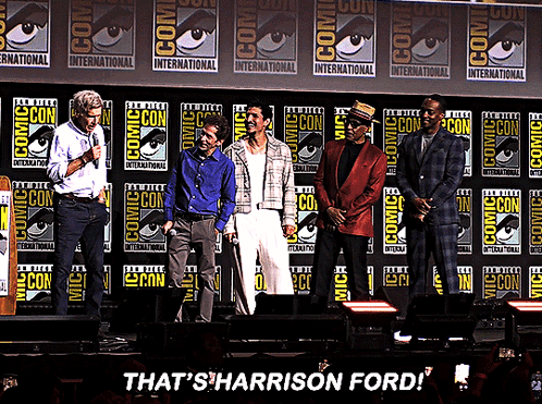 Group Of Men On Stage With That's Harrison Ford Sign GIF