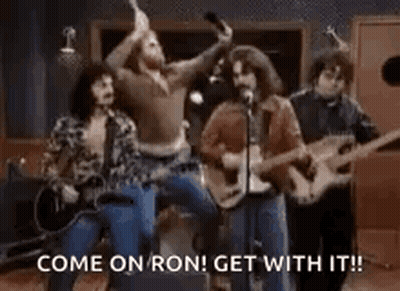 Group Of Men Playing Guitars And Singing In A Band GIF