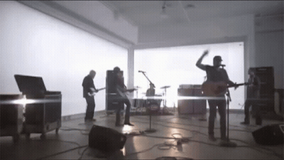 Group Of Men Playing Instruments GIF