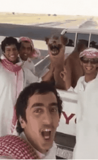 Group Of Men Posing For Selfie In Front Of Toyota Truck GIF