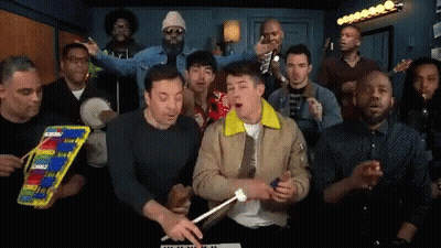 Group Of Men Singing And Playing Xylophone GIF