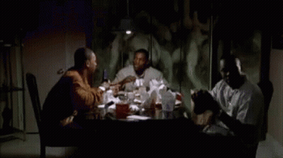 Group Of Men Sitting Around Table With Wine GIF