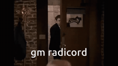 Group Of Men Sitting At Bar GIF