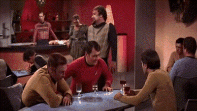 Group Of Men Sitting At Table With Wine Glasses GIF
