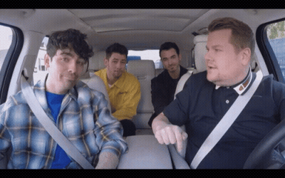 Group Of Men Sitting In Car One Wearing Plaid Shirt GIF
