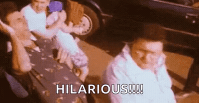 Group Of Men Sitting In Front Of Car Saying Hilarious GIF