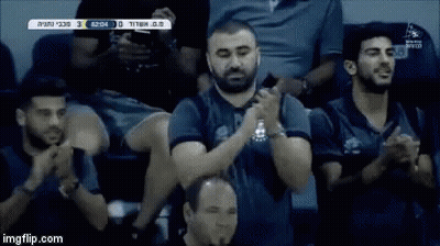 Group Of Men Sitting In Stadium Clapping GIF