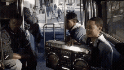 Group Of Men Sitting On Bus With Boombox GIF