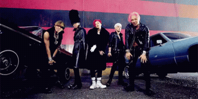 Group Of Men Standing Beside Blue Car GIF