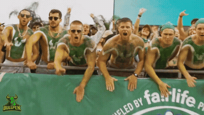 Group Of Men Standing In Front Of Bullpen Banner GIF