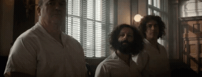 Group Of Men Standing In Front Of Window GIF
