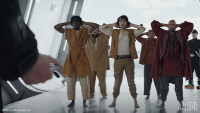 Group Of Men Standing In Room With Andor GIF