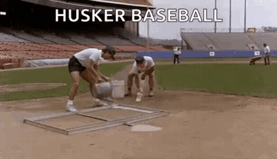 Group Of Men Standing On Baseball Field GIF