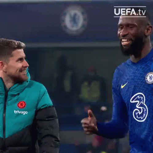Group Of Men Standing On Field GIF
