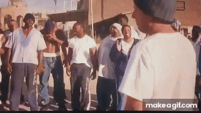 Group Of Men Standing On Sidewalk GIF