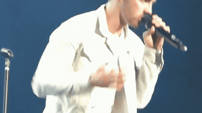 Group Of Men Standing Together Saying This Guy GIF