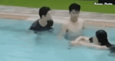 Group Of Men Swimming In Pool GIF