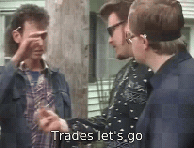Group Of Men Talking One Pointing At Camera GIF