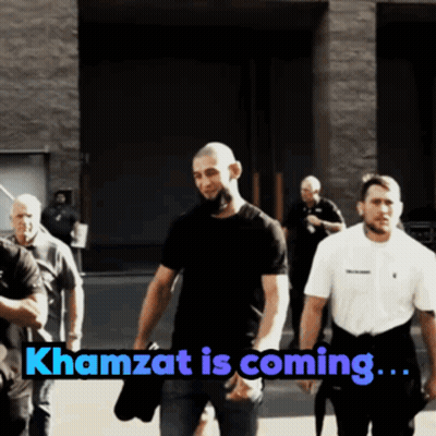 Group Of Men Walking Down Street Khamzat Is Coming GIF