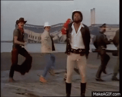Group Of Men Walking Down Street One Holding Red Glove GIF