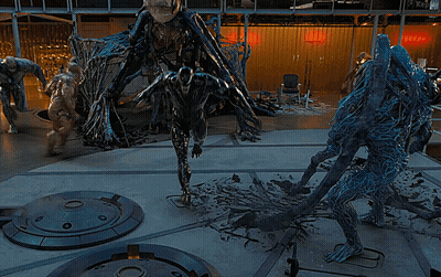Group Of Monsters Standing In Room With Kepler GIF