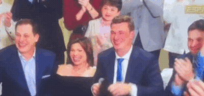 Group Of People Applauding In Room GIF