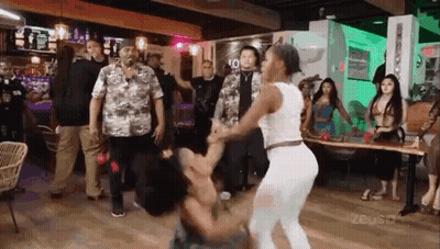 Group Of People Dancing In A Bar GIF