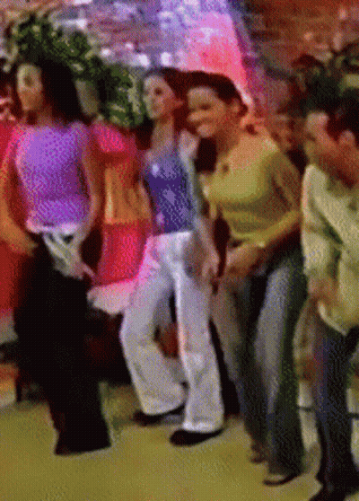 Group Of People Dancing In A Line GIF