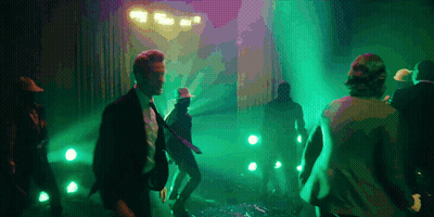 Group Of People Dancing In Dark Room GIF