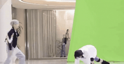 Group Of People Dancing In Front Of Green Screen GIF