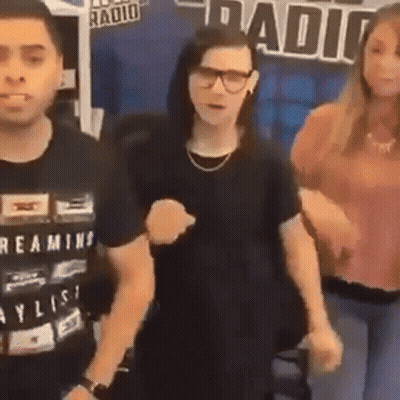 Group Of People Dancing In Front Of Radio Station GIF