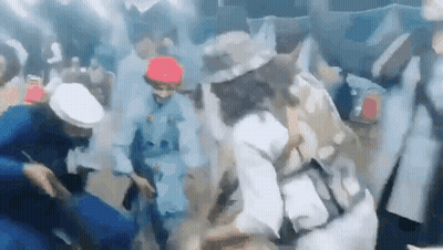 Group Of People Dancing In Smoky Room GIF