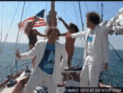 Group Of People Dancing On A Boat GIF