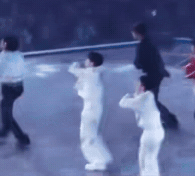 Group Of People Dancing On Blue Surface GIF