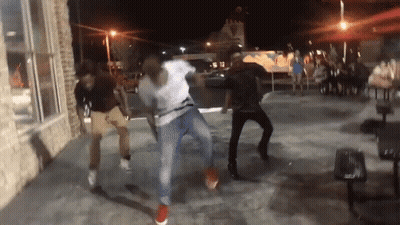 Group Of People Dancing On Sidewalk GIF