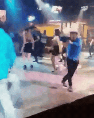 Group Of People Dancing On Stage In Club GIF
