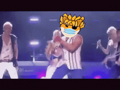 Group Of People Dancing On Stage With Man In Mask GIF