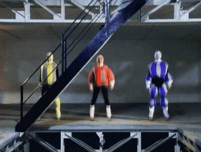 Group Of People Dancing On Stage With Staircase GIF