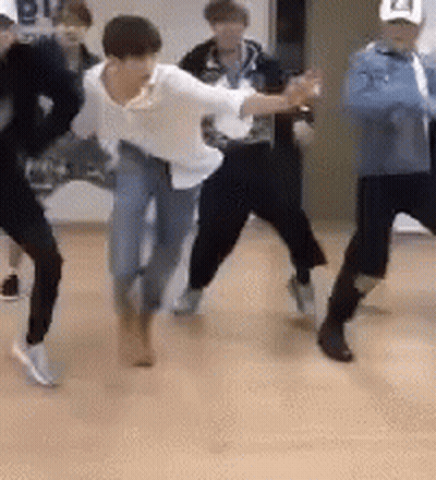Group Of People Dancing On Wooden Floor GIF