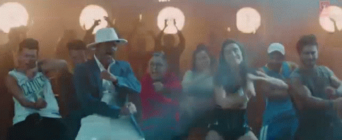 Group Of People Dancing Together GIF