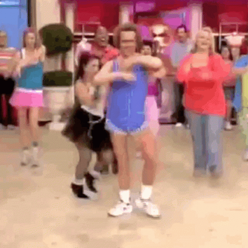 Group Of People Dancing Together GIF