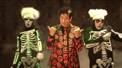 Group Of People Dressed As Skeletons Dancing GIF