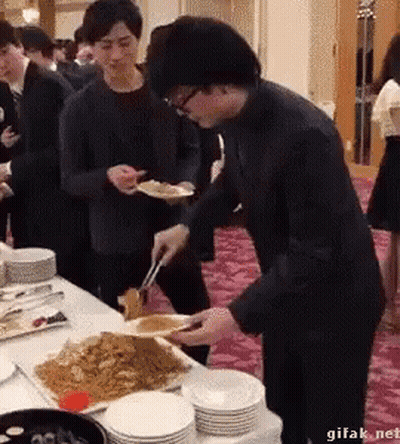 Group Of People Eating At Table GIF