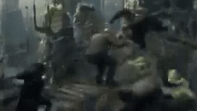 Group Of People Fighting In Blurred Scene GIF