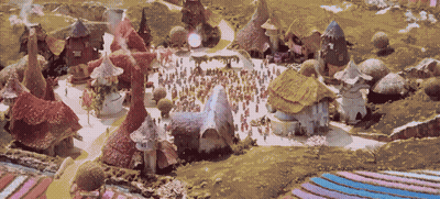 Group Of People Gathered In Small Village GIF