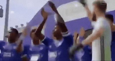 Group Of People Holding Trophy GIF