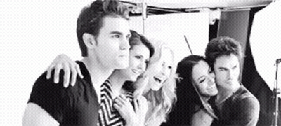 Group Of People In Black And White Photo GIF